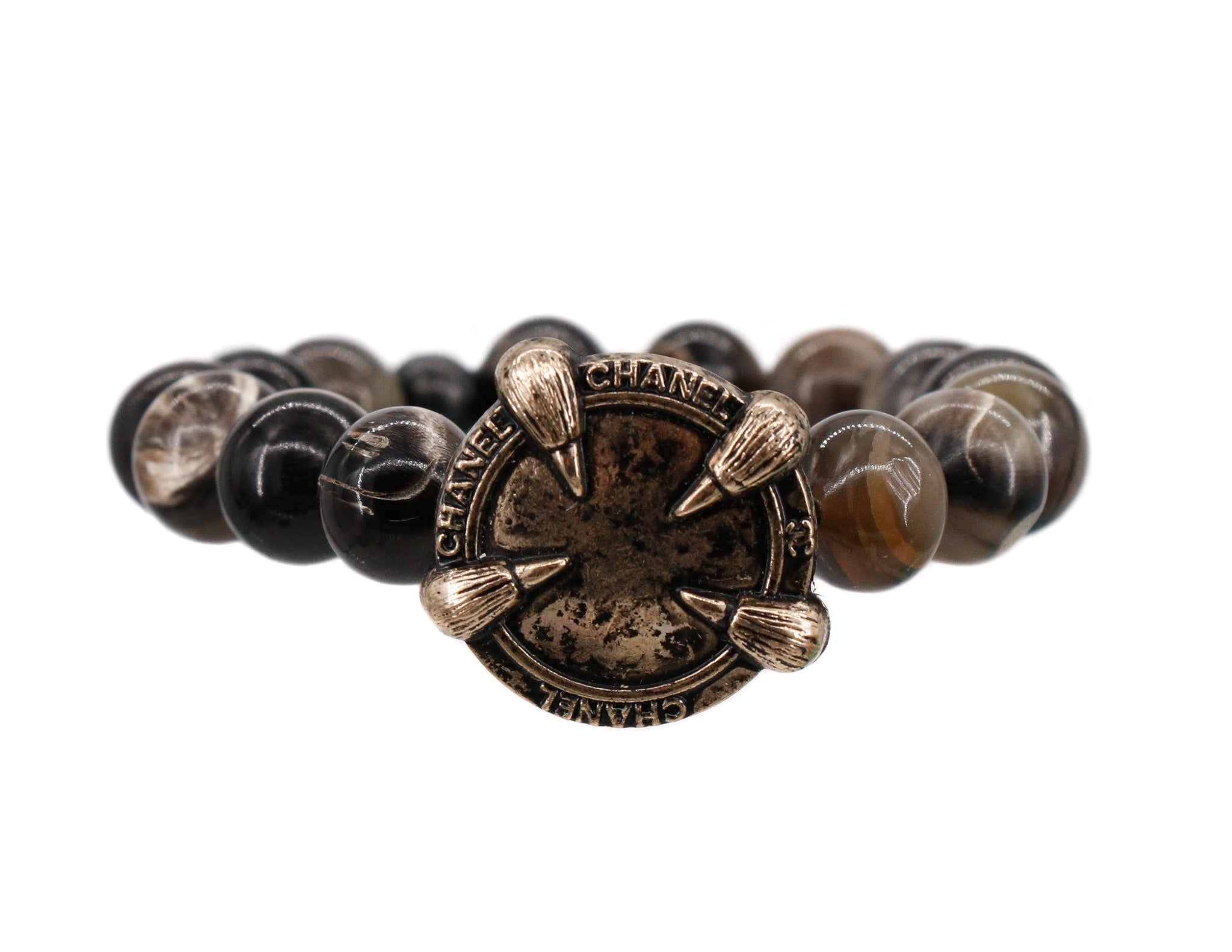 Buffalo horn with repurposed designer button bracelet