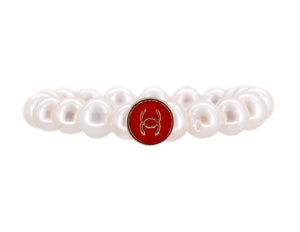 Freshwater pearl bracelet with a red repurposed designer button