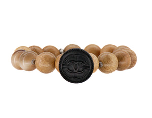 Sandalwood and horn bracelet with a repurposed designer button