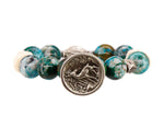 Load image into Gallery viewer, Chrysocolla bracelet with a vintage stag button
