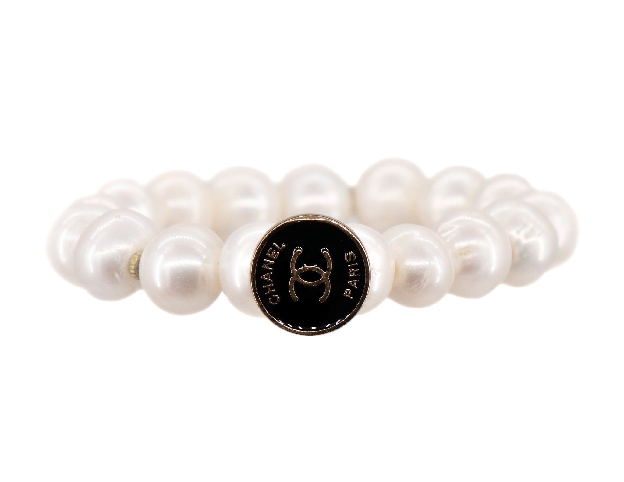 Freshwater pearls with black repurposed designer button
