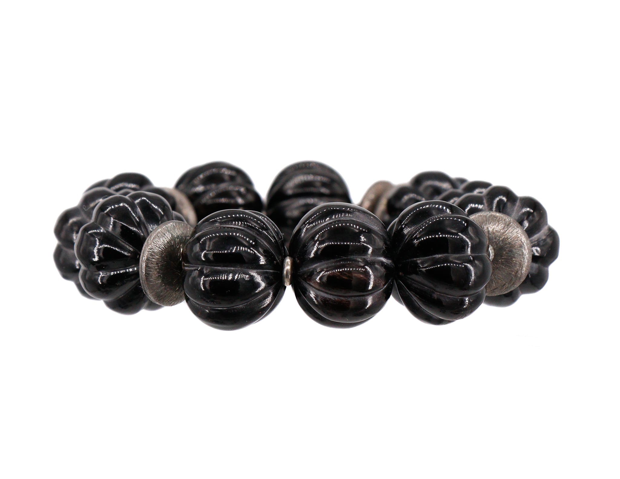 Carved black water buffalo bead bracelet with silver