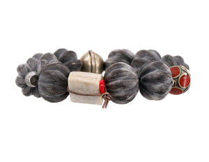 Carved matte buffalo horn bead bracelet with coral