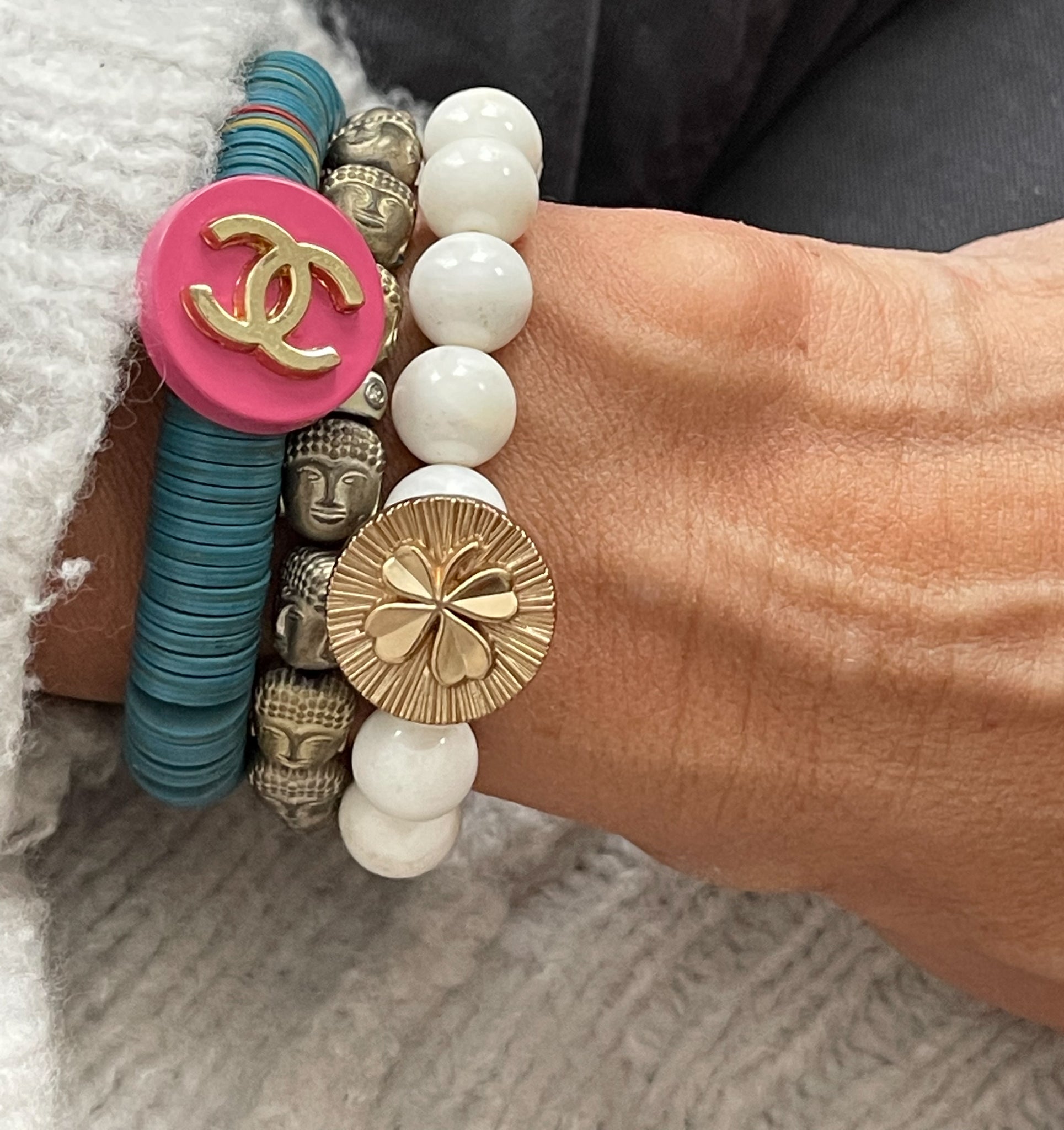 African vinyl bracelet with a repurposed pink designer button