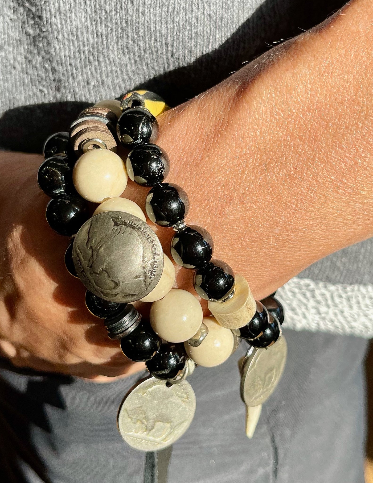 SKO Buffs bracelet with a "buffalo nickel", river stone and coconut
