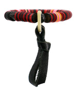 Load image into Gallery viewer, African vinyl bracelet with a suede tassel
