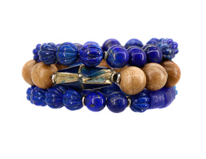 Carved lapis bracelet with African trade beads