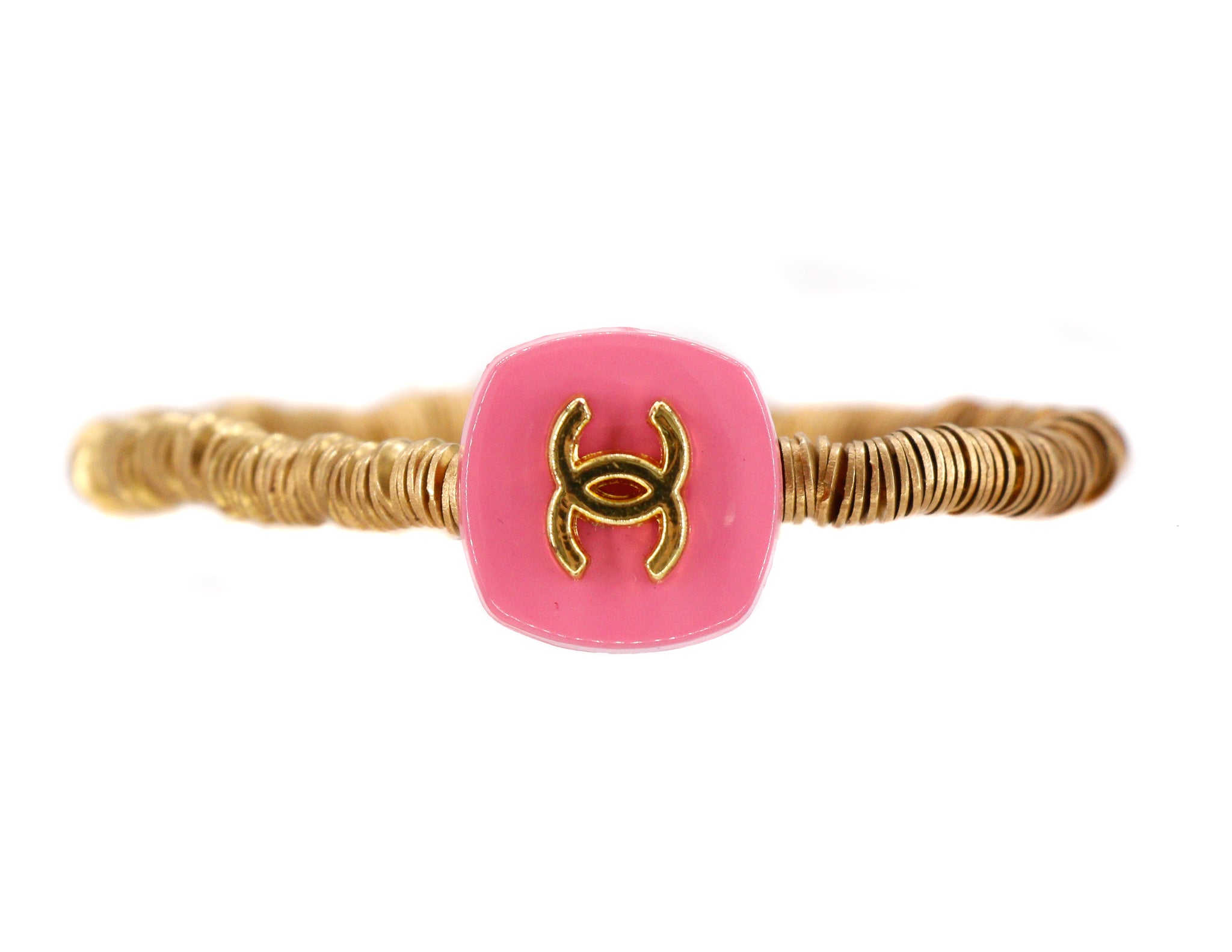 Brass heishi bead bracelet with a pink repurposed designer button