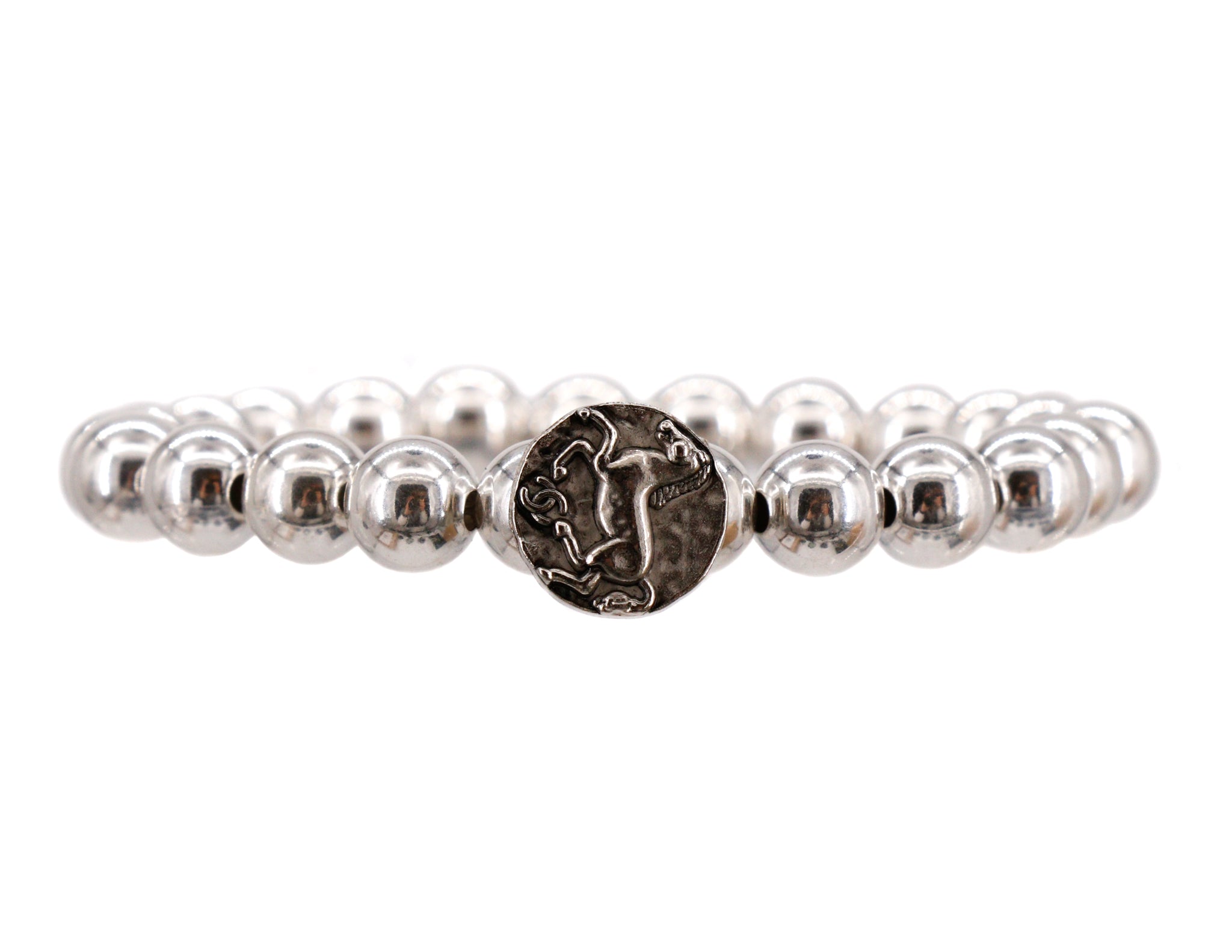 Sterling silver bracelet with a repurposed designer horse button