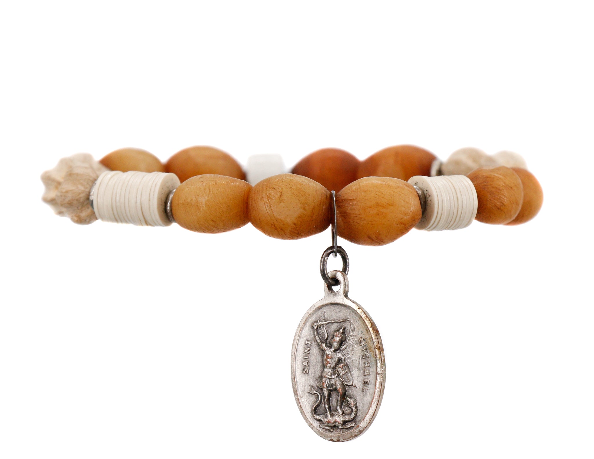 Natural cream carved beads with African vinyl and a vintage religious medallion bracelet